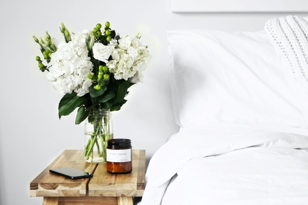flowers-in-clear-glass-vase-on-table