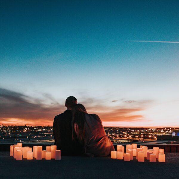 a couple looking at the sunset