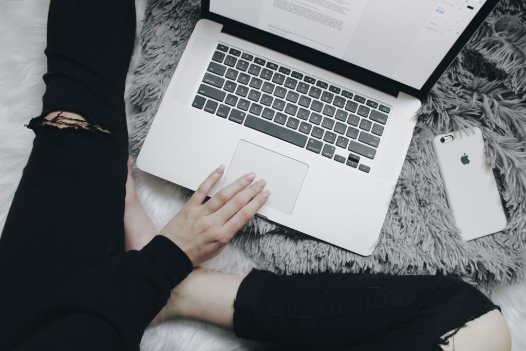 a woman working on her laptop