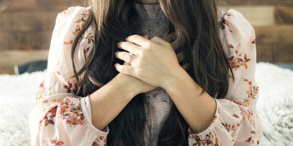 woman-in-white-and-red-showing-gratitude