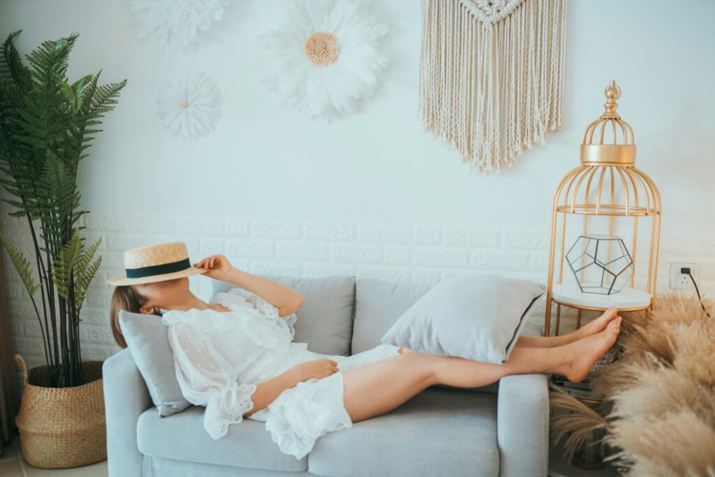 woman lying on sofa practicing mindfulness