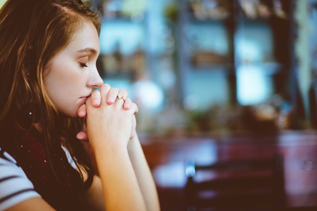 a girl meditating before journaling