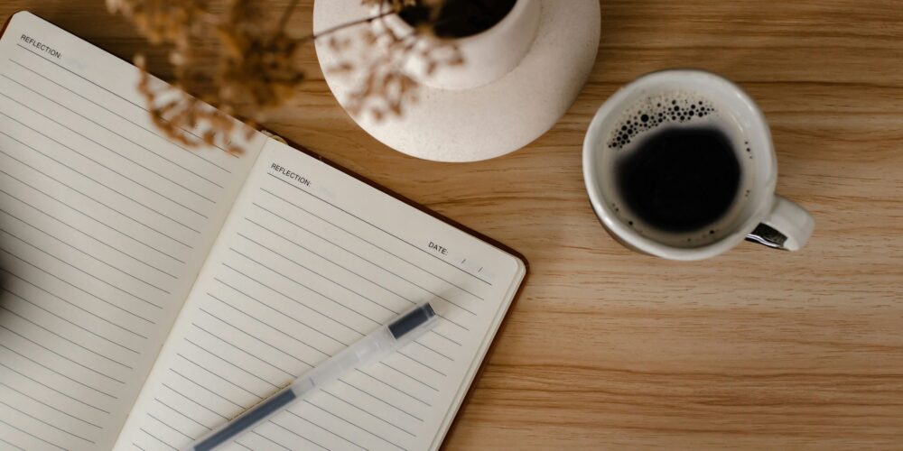 a blank journal on a table