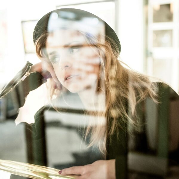 photo of woman thinking if journaling can help her with procrastination