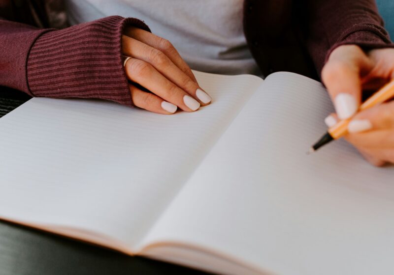 a girl writing her daily journal
