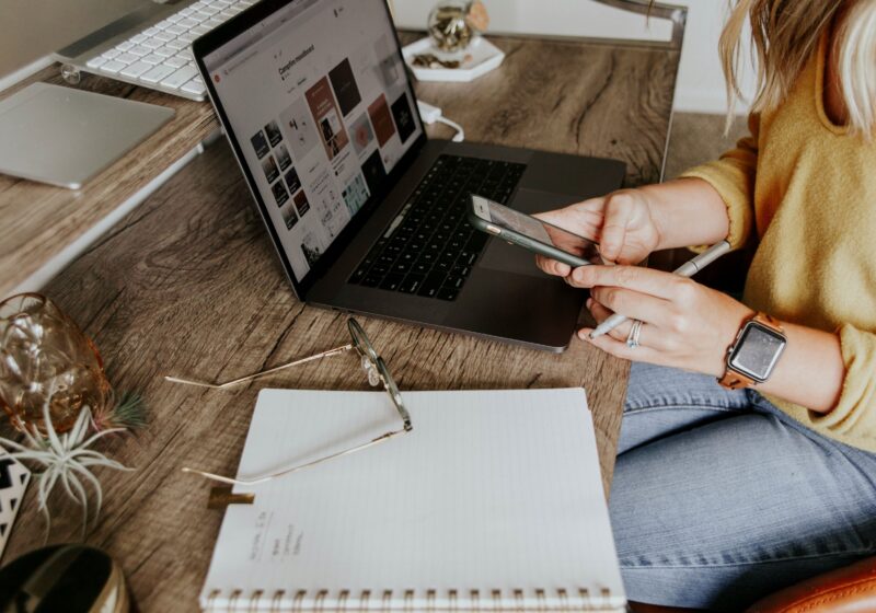 A woman working on her laptop, representing the daily hustle and the need for work-life balance in a modern professional's life.